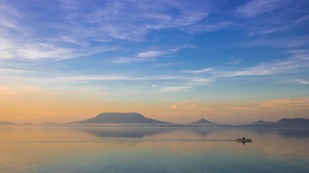 Lake Balaton, Badacsony Hill, fishing on Balaton lake, boat, sunset